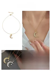 Detailed view of moon and water drop necklace featuring micro-set zircon on delicate chain