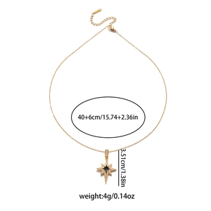 Gold eight-pointed star necklace with black enamel center and white zircon stones