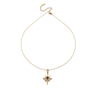 Elegant gold eight-pointed star necklace with black enamel and sparkling zircon detail