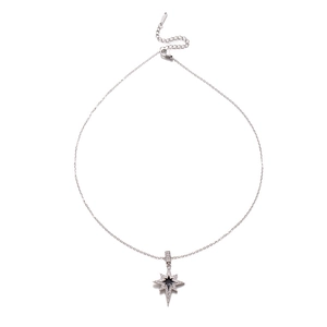 Elegant silver eight-pointed star necklace with black center and sparkling crystal border