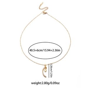 Elegant gold celestial necklace featuring a crescent moon pendant and a tiny star charm