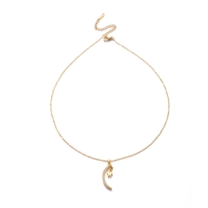 Elegant gold star and moon pendant necklace with pavé zircon details on a dainty chain