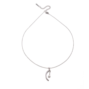 Silver star and moon pendant necklace with sparkling cubic zirconia on a white background