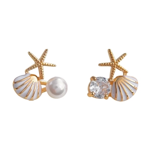 Boucles d'oreilles asymétriques étoile de mer et coquillage avec perles et zircons