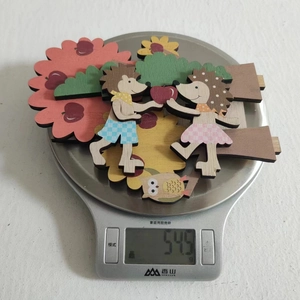 Detailed view of Thanksgiving wooden hedgehog and apple tree decor weighing 54.5g