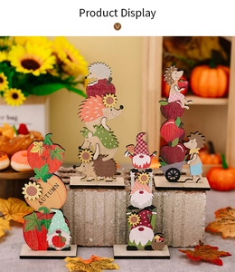 Detailed view of wooden autumn gnome and pumpkin ornaments for Thanksgiving table decor