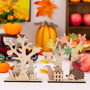 Set of two colorful autumn forest wooden table ornaments featuring hedgehogs and trees