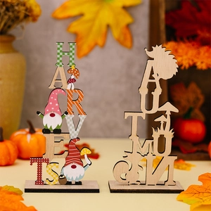 Macro detail of Harvest and Autumn wooden tabletop signs with gnome and hedgehog decor