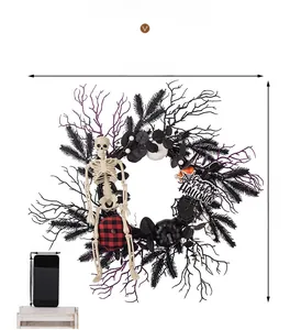Detailed view of Halloween wreath with skeleton and pumpkin showing 60cm size dimensions