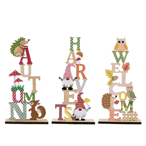 Three-piece wooden autumn table decor set featuring owl, squirrel and harvest lettering