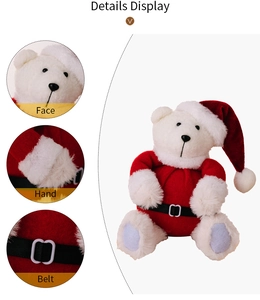 Detailed close-up of the plush Christmas bear's face, cute red hat, and buckled belt design