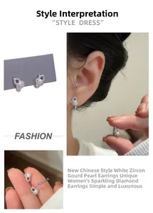 Close-up of gourd stud earrings with cubic zirconia and white pearls, 1cm size detail