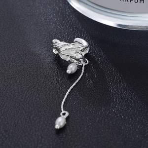 Silver lava texture ear cuff with elegant metal tassels and glossy white teardrop pearls