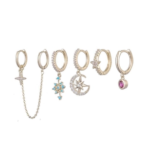 Ensemble détaillé de 6 boucles d'oreilles dorées avec gemmes bleues et étoiles