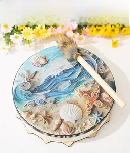 Macro shot of circular ocean themed ocean wave drum with 3D shells and starfish decor