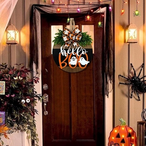 Halloween wooden door sign featuring a white ghost, hello BOO text, and a plaid bow