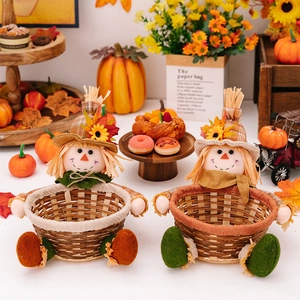 Detail view of woven scarecrow candy baskets for autumn harvest home decorations