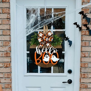 Halloween wooden round sign with hello BOO text, ghost pattern, and orange plaid bow