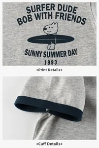 Detail of heather grey cotton T-shirt featuring surfing dog print and navy ribbed cuffs
