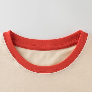 T-shirt en coton pour enfants avec col rond côtelé orange et tissu beige doux