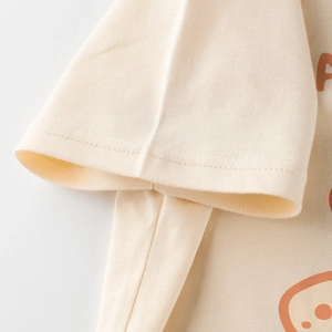 T-shirt enfant en coton crème avec imprimé dessin animé et coutures double aiguille