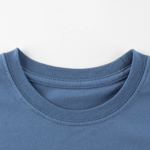 Close-up of a blue crew neck cotton T-shirt featuring a durable ribbed neckline design