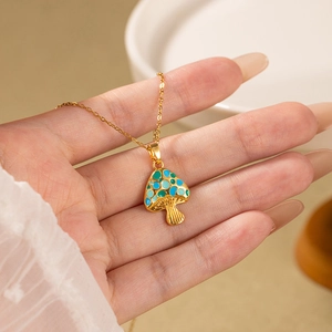 Chic mushroom pendant necklace with colorful enamel dots on a gold thin link chain