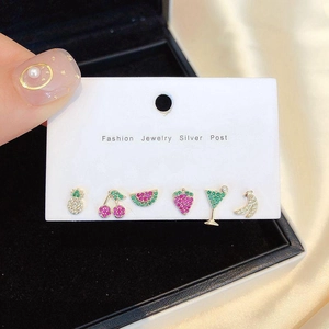 Detailed set of six crystal fruit earrings featuring pineapple and strawberry designs