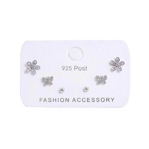 Detail of 925 silver earring set featuring purple flowers, butterflies and round studs