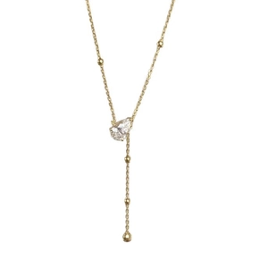 Elegant gold Y-shaped necklace featuring a teardrop crystal pendant and delicate beads