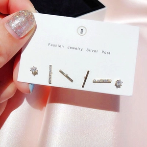 Detailed macro view of 6-piece gold-plated star and moon stud earring set with zircon
