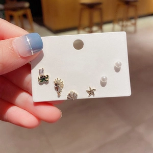 Detail of 6-piece ocean themed earring set with octopus, seahorse, and starfish designs