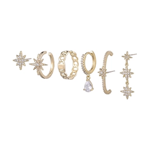 Detail of 6-piece gold hollow star and moon earring set with sparkling zircon accents