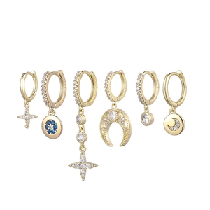 Bohemian gold earring set with hollow moon, star, and evil eye zircon charms