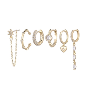 Detailed view of 6-piece gold earring set with star, heart, and zircon embellishments