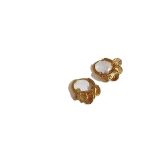 Elegant gold round hoop earrings with radiant pleated fan pendants on white background