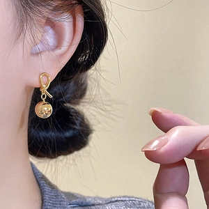 French vintage knotted gold ball drop earrings for women with a high-polished mirror finish