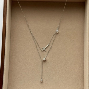 Collier Double Couche Élégant Cuivre Pendentif Croix Zircon Cylindre Künstliche Perle Style De Luxe Français Bijoux Pour Femmes