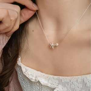 Elegant starfish pearl necklace for women featuring a minimalist silver pendant on a thin chain