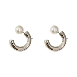 Minimalist silver C-shaped hoop earrings featuring white pearls in a modern symmetrical layout