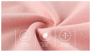 Macro shot of soft pink cotton fabric showing breathable texture and fine knit detail