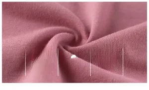 Close-up of soft purple breathable cotton knit fabric with Grade A safety standards