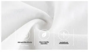 Close-up of soft Class A certified white cotton fabric with breathable texture