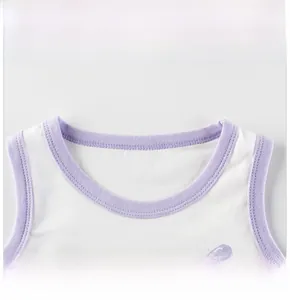 Detail of white cotton toddler vest featuring light purple ribbed neckline and fine stitching