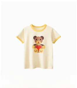 Detail of baby cotton T-shirt featuring a cute cartoon bear print and yellow ribbed trim