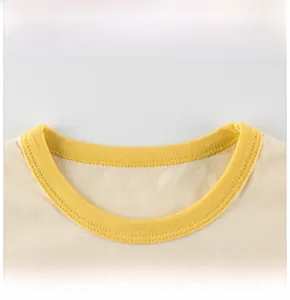 Detail of yellow ribbed neckline on cream cotton t-shirt with reinforced stitching