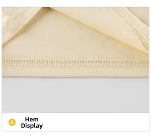 Detail view of cotton t-shirt hemline with high-quality double-needle lockstitch finish