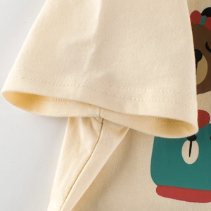 T-shirt beige pour enfant en coton à manches courtes avec imprimé ours et détail de manche