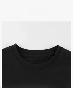 Close-up of a durable ribbed neckline on a premium black cotton kids' T-shirt