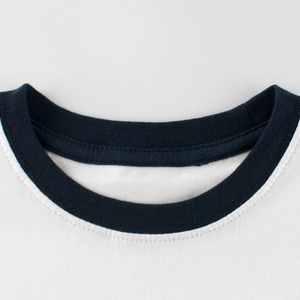 Classic white ringer T-shirt for girls featuring a navy blue ribbed crew neck detail
